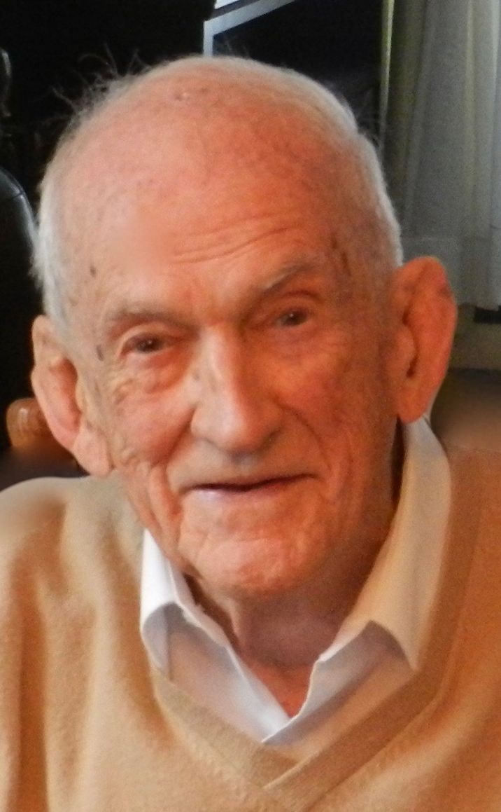 E. Raymond Côté