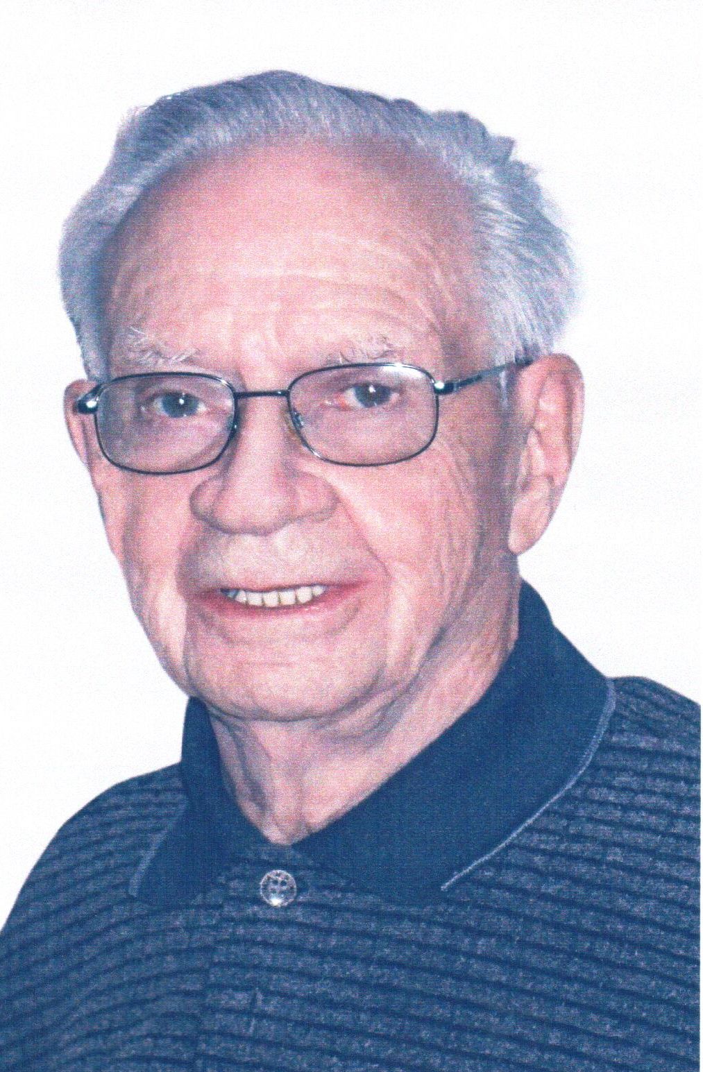 J.Roland Côté